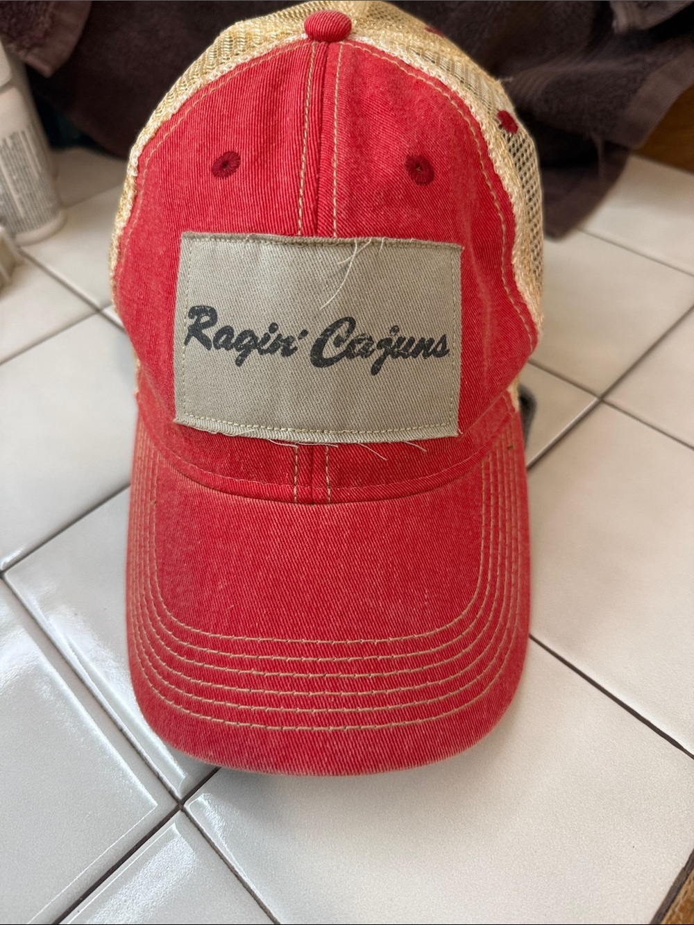 Louisiana Ragin' Cajuns Red Mesh-Back Trucker Hat for men or women